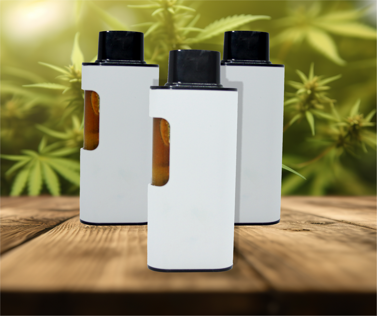 Three blank white cannabis vape juice bottles on a wooden table with cannabis plants background
